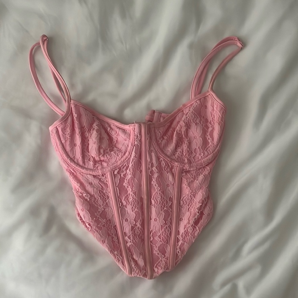from a boutique in long beach island, small pink adjustable corset